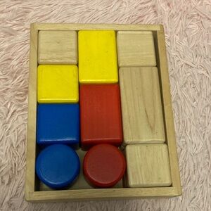 Wooden shape sorting toy